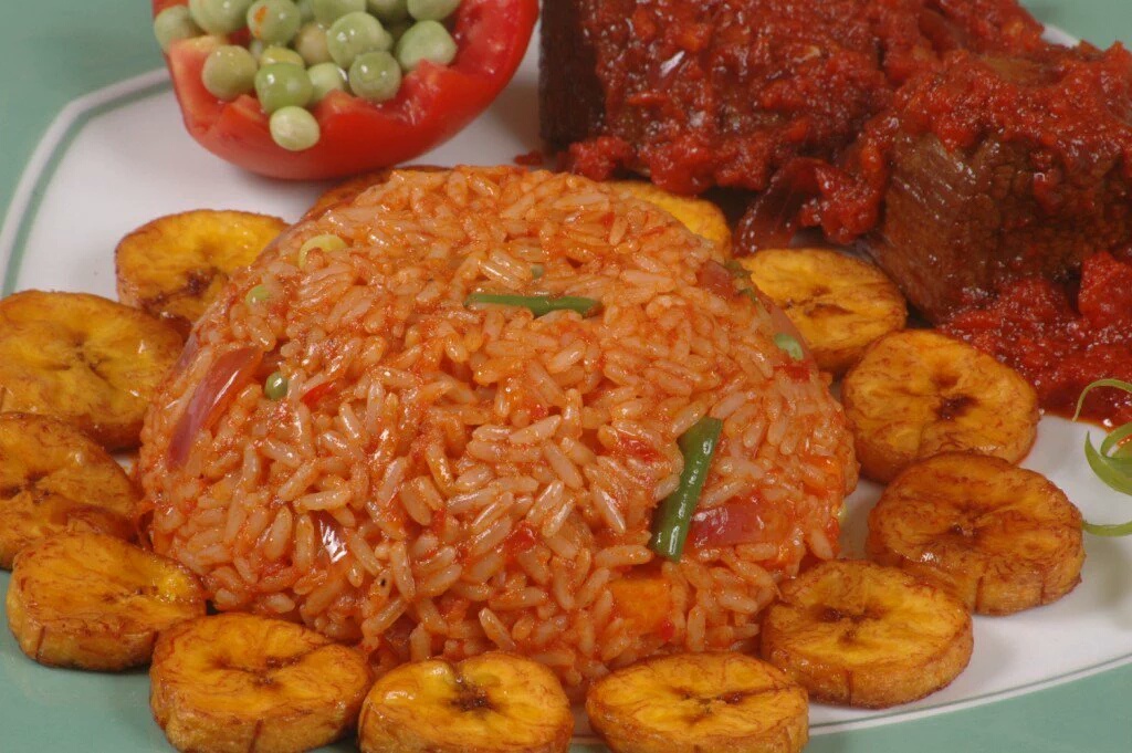 Jollof rice with chicken and sides